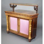 A Regency rosewood chiffonier with raised mirrored back and 3/4 gallery, the base fitted a