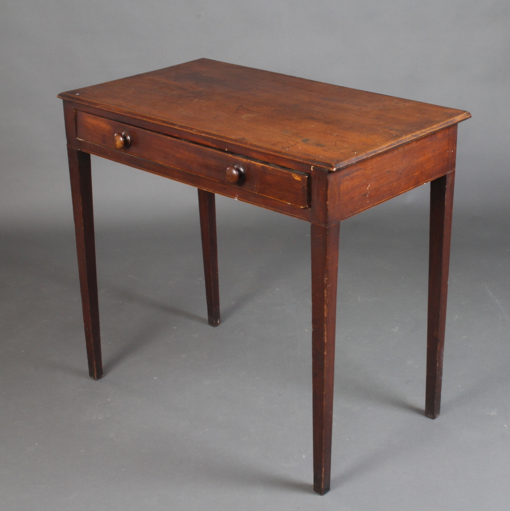 A Georgian rectangular mahogany side table fitted a drawer, raised on square tapered supports 79cm h