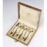 A set of six 800 standard gilt teaspoons, boxed, 65 grams