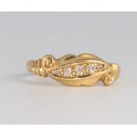 An 18ct yellow gold 5 stone diamond ring 2.2 grams, size M