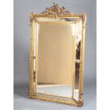 A 19th Century style rectangular bevelled plate mirror with crest inlaid quivers, contained in a