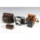 An Agiflex camera, the back marked Croydon England R6684 complete with leather case together with