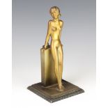 Lorenzl, an Art Deco spelter table lighter in the form of a standing naked lady raised on square
