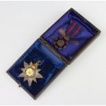 A Primrose League Dress badge and a sports medallion