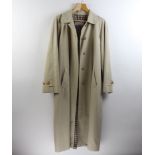 A lady's single breasted Aquascutum shower proof rain coat/mac