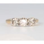 An 18ct yellow gold 3 stone diamond ring approx. 1.55ct, size M