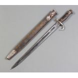 A Victorian bayonet having a 43cm blade marke with royal cypherThere has been some vigorous cleaning