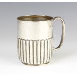 An Edwardian silver demi-fluted mug by Henry Wilkinson & Co, London 1903, 9cm, 143 grams