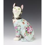 A reproduction figure of a Galle cat, the blue ground decorated with flowers 33cm