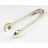 A pair of Georgian Irish silver tongs Dublin 1801 22cm, 120 grams