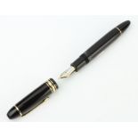 A Mont Blanc fountain pen with 14ct nib, 15cm