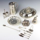 An oval silver plated entree set and minor plated items