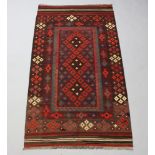 A blue and red ground Ghalmori Kilim rug 196cm x 102cm