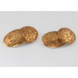 A pair of 18ct yellow gold oval engraved cufflinks 6.9 grams