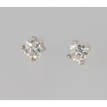 A pair of 18ct white gold brilliant cut diamond ear studs, approx. 0.6ct