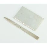 A commemorative silver paper knife, Birmingham 1977 and a silver card case 92 grams