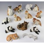 A Russian figure of a tiger cub 12cm and 13 other figures of animals