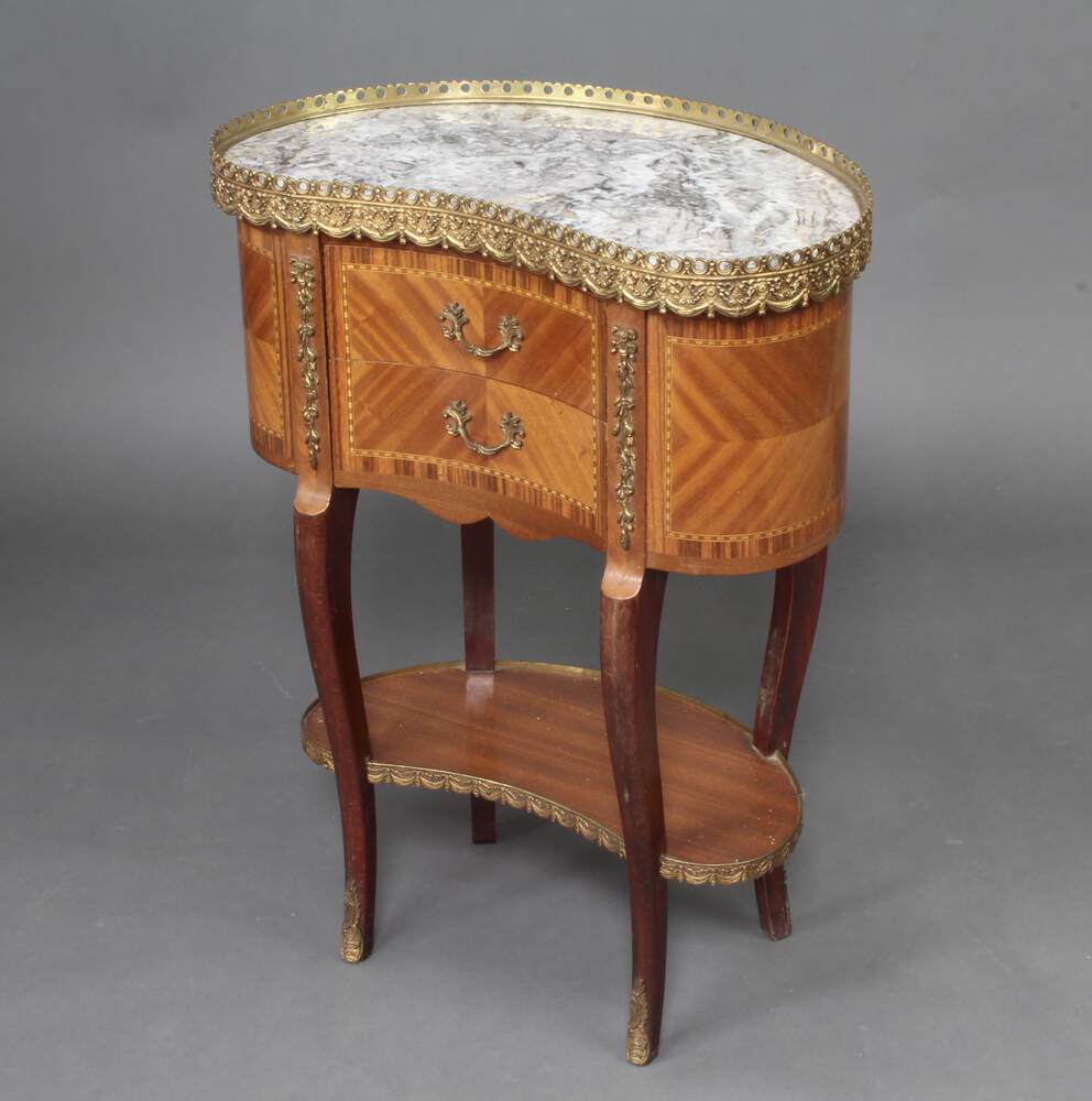 A Continental inlaid kingwood kidney shaped chest with gilt metal gallery fitted 2 drawers above