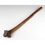 A Fijian rootstock 'Vunikau' war club, 65cm long, the width of the rootstock head approx 10cm. The