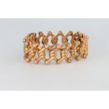 A 9ct yellow gold expanding bracelet 13 grams