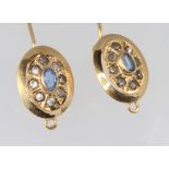 A pair of 18ct yellow gold sapphire set oval earrings 2.6 grams
