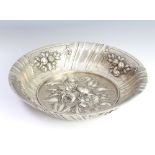 A Continental repousse silver bowl decorated with flowers 27cm, 429 grams