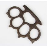 A WW1 steel knuckle duster 19cm x 6.5cm