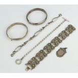 A silver bracelet and minor silver jewellery 105 grams