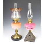 A Victorian orange opaque glass oil lamp reservoir complete with shade and chimney, 58cm h x 17cm