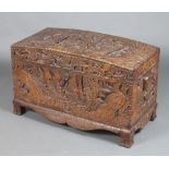 A Chinese domed and carved camphor coffer with hinged lid 55cm h x 89cm w x 44cm d