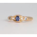 An 18ct yellow gold sapphire and diamond ring 4.1 grams, size P 1/2
