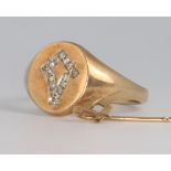 A gentleman's 9ct yellow gold diamond set Masonic ring together with a ditto tie pin 10.1 grams
