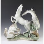 An impressive Lladro group of 3 horses playing 44cm