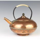 A Dresser style circular copper kettle with iron handle 9cm x 20cm