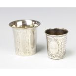 Two Continental chased silver beakers 120 grams