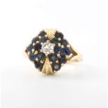 A 14ct yellow gold sapphire and diamond cluster ring 7.1 grams