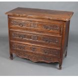 A Continental oak chest of 3 long carved drawers with iron ring drop handles 90cm h x 110cm w x 54cm