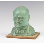 A Second World War resin Churchill Save for Victory money box in the form of a portrait bust of