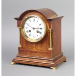 Japy Freres, a French 8 day striking mantel clock with enamelled dial and Roman numerals contained