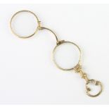 A pair of Edwardian gilt pince nez