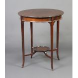 An Edwardian circular mahogany 2 tier occasional table with undertier 71cm h x 60cm w Some light