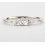 An 18ct white gold 4 stone diamond ring approx. 0.3ct, size K 1/2