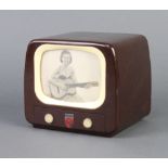 A Philips Bakelite musical box in the form of a Philips television with a figure of a lady playing a