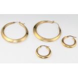 Two pairs of 9ct yellow gold hoop earrings 5.9 grams