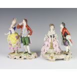 A German porcelain figure group of a lady and gentleman raised on a rococo base 17cm, a ditto 15cm 1