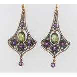 A pair of silver gilt, peridot, amethyst and diamond earrings