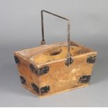 A "The Gordon" pine and metal bound housemaids box of waisted form, tray to the top and swing handle