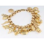 A 9ct yellow gold charm bracelet 27.9 grams
