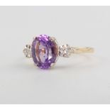 A 9ct yellow gold amethyst dress ring size L