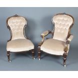 A Victorian carved mahogany open armchair together with a nursing chair upholstered in mushroom